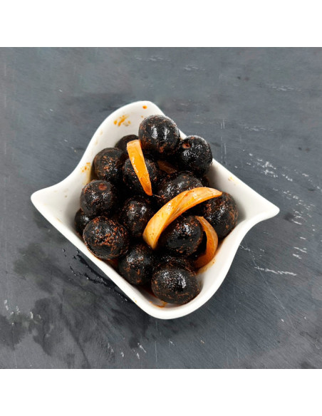 Aceitunas negras al estilo de León